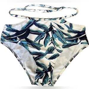 Swimsuit bottoms with palm leaves and waist strap detail